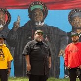 (L-R) Atlanta Influences Everything founders Tory Edwards, Ian Ford and Bem Joiner pose in front of their mural in Atlanta on Tuesday, April 2, 2024. (Arvin Temkar / arvin.temkar@ajc.com)