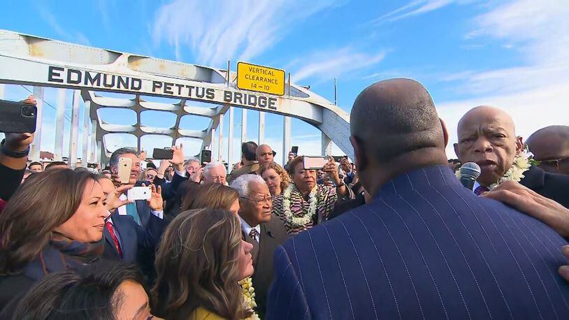The late U.S. Rep. John Lewis, right, at a commemoration of the Bloody Sunday march in Selma, Ala.