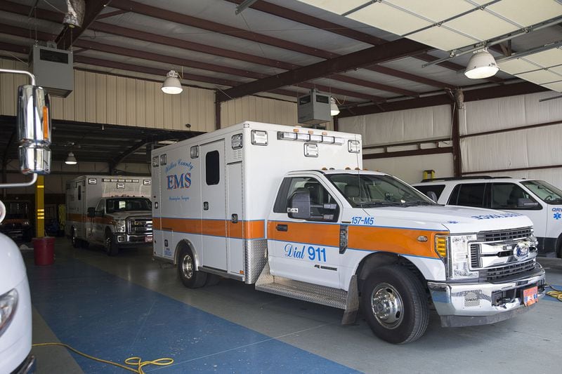 Emergency medical vehicles sit in the garage of the Wilkes County Emergency Medical Services Station 1 building in Washington. (Alyssa Pointer/Atlanta Journal Constitution)
