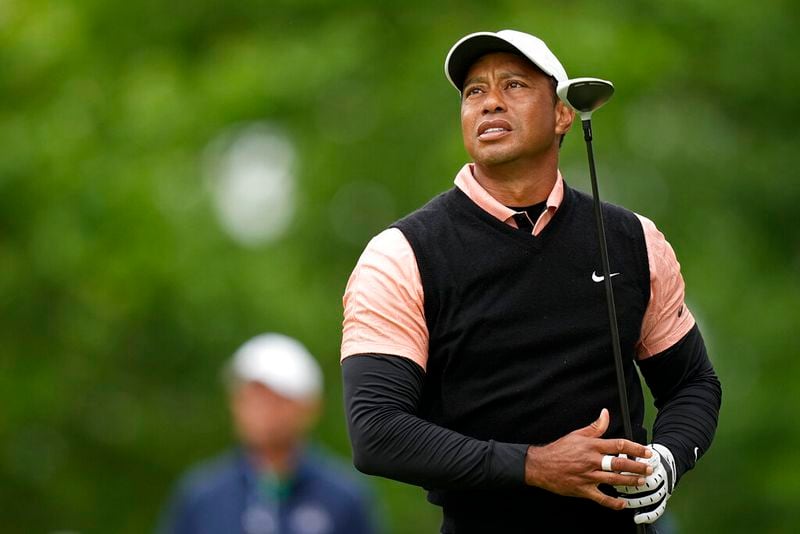 Tiger Woods watches his tee shot on the 17th hole during the third round of the PGA Championship golf tournament at Southern Hills Country Club, Saturday, May 21, 2022, in Tulsa, Okla. (AP Photo/Eric Gay)