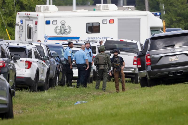 Police respond after three Louisiana police officers were shot in a standoff Sunday, April 28, 2024, in Kenner, La. (Scott Threlkeld/The Times-Picayune/The New Orleans Advocate via AP)