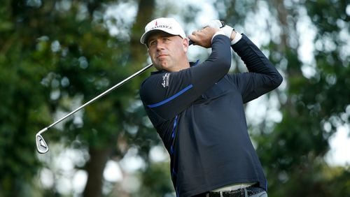 Stewart Cink tees off on the third hole at the Innisbrook Copperhead course in Thursday's first round of the Valspar Championship.  (Michael Reaves/Getty Images)