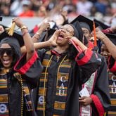  Graduates celebrate during Clark Atlanta University's commencement ceremony in Panther Stadium Saturday, May 20, 2023. (Steve Schaefer/steve.schaefer@ajc.com)