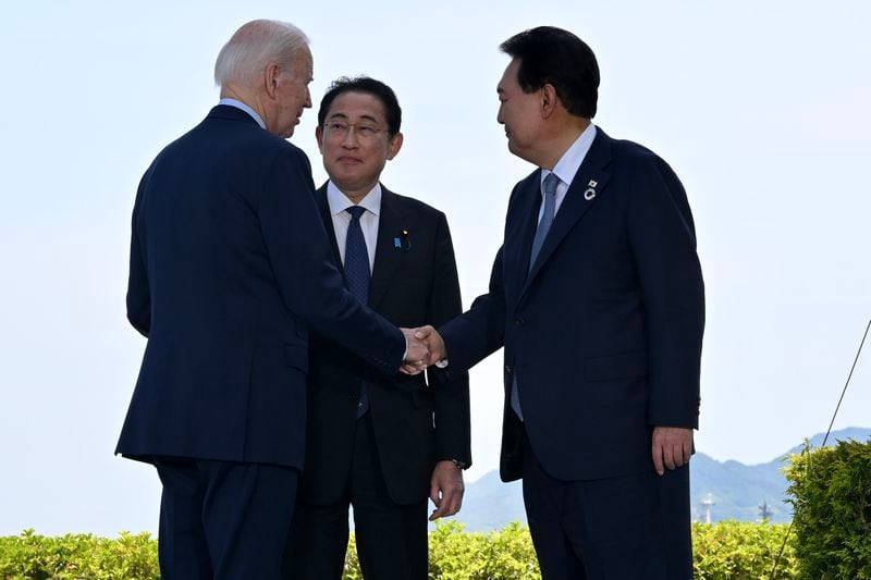 From left, U.S. President Biden, Prime Minister Fumio Kishida of Japan and President Yoon Suk Yeol of South Korea during the Group of 7 summit in Hiroshima, Japan on May 21, 2023. The president will host the leaders of the two Asian democracies at Camp David, as Russia’s invasion of Ukraine spurs them to rapidly mend relations. (Kenny Holston/The New York Times)