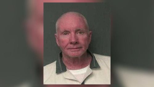Tec McIver, shown here is his state Department of Corrections mug shot, is fighting a wrongful death lawsuit filed by his dead wife’s estate.
