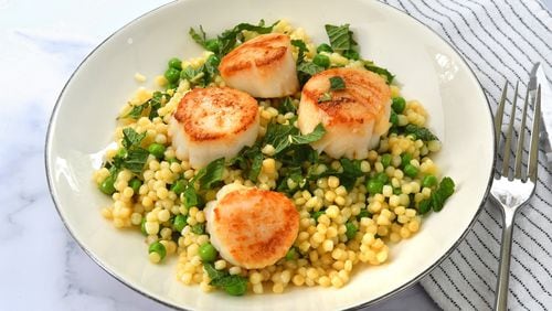 Seared Scallops with Minty Peas and Couscous. 
Chris Hunt for The Atlanta Journal-Constitution