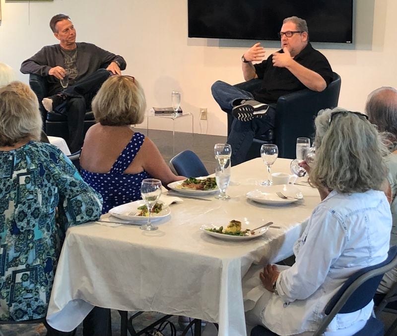 Author Mickey Dubrow (right) talks about his book, “American Judas,” at a literary event in Fernandina Beach, Fla., while SFK Press co-founder Steve McCondichie looks on. CONTRIBUTED