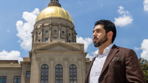Patrick Rodriguez stands outside the Georgia State Capitol. He is the co-executive director of Georgia Coalition for Higher Education in Prison. The organization is trying to expand higher education possibilities for people in prison. PHIL SKINNER FOR THE ATLANTA JOURNAL-CONSTITUTION