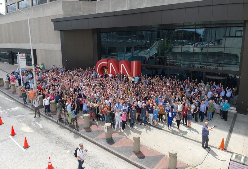A drone shot of the CNN alumni photo around the CNN logo on Centennial Olympic Park Drive June 1, 2023 as part of a farewell celebration to CNN Center and its legacy. MATT SLOANE