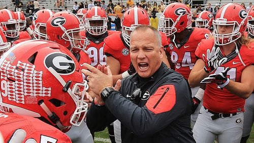 Georgia coach Mark Richt fires up his players as they prepare to play Georgia Tech on Saturday, Nov. 28, 2015, in Atlanta. This was Richt's last game as coach at Georgia.  Curtis Compton / ccompton@ajc.com
