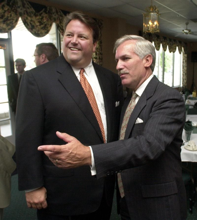 Dean Alford, right, Chairman of the Board Rockdale Hospital & Health System, introduces Lieutenant Governor Mark Taylor, left, to guests at the first annual Regional Health Care Forum at the Georgia International Horse Park in Rockdale County on Tuesday, July 10, 2001. Taylor was the honorary guest speaker for the event. 