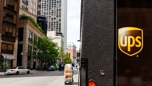 A UPS delivery truck in May 2018 in Chicago. UPS continued riding a wave of skyrocketing shipping demand from online shopping and vaccine deliveries in the first quarter of the year, with both profit and revenue soaring. (Jonathan Weiss/Dreamstime/TNS)