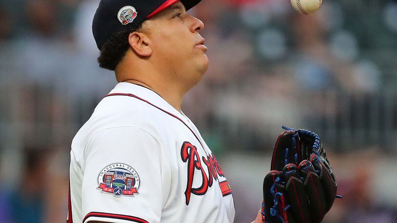 Braves pitcher Bartolo Colon flips the ball reacting after giving up a run-scoring double to the New York Mets’ Neil Walker in a recent game. Colon has the highest ERA of any pitcher on the Braves’ active roster (7.22) and has a record of 1-4 after seven starts. (Curtis Compton/ccompton@ajc.com)