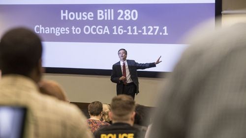 Jeff Milsteen, Kennesaw State University Chief Legal Affairs Officer, addresses a room filled with members of the KSU community about House Bill 280 on June 22, 2017. Chad Rhym/ Chad.Rhym@ajc.com