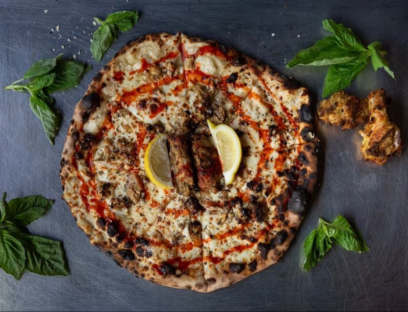 Atlanta native Matthew Foster wanted to create a pizza that pays tribute to Atlanta culture. His solution: Phew’s Pies’ hot lemon pepper wet pie. Courtesy of Drew Amandolia