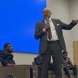 Morehouse College President David A. Thomas answers questions about President Joe Biden’s planned commencement speech during a student town hall meeting Tuesday on campus. (Photo Courtesy of Chauncey Alcorn/Capital B)