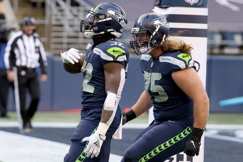 The Seattle Seahawks have cut ties with offensive lineman Chad Wheeler, right, after his arrest last weekend for investigation of domestic violence. (Abbie Parr/TNS)