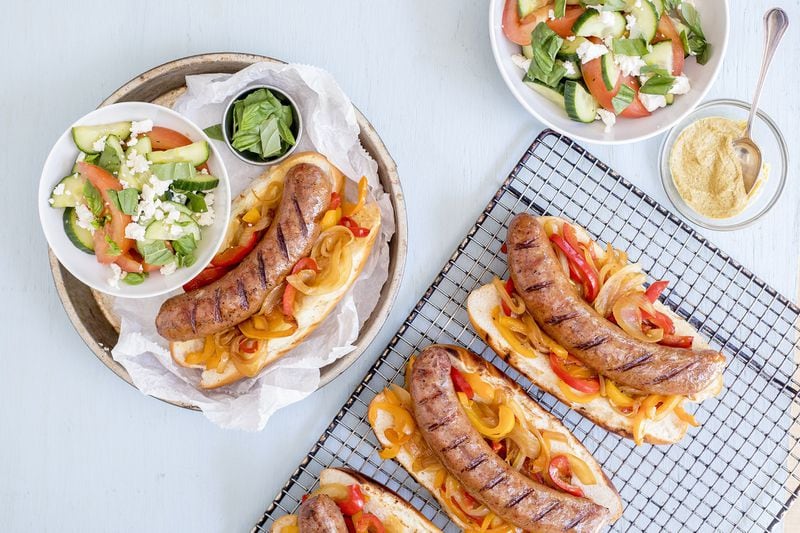 The meal kit for these grilled brats with caramelized peppers and onion features bratwurst from Avondale Estate’s Pine Street Market, made with pork from Riverview Farm in Ranger. CONTRIBUTED BY KATE BLOHN FOR PEACHDISH