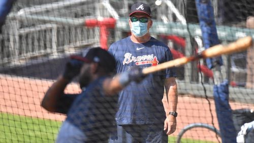 Braves hitting coach Kevin Seitzer wears a mask while watching batting practice on Saturday, July 4, 2020. (Hyosub Shin / Hyosub.Shin@ajc.com)