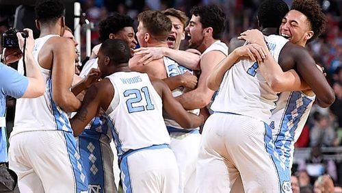 GLENDALE, AZ - APRIL 03: North Carolina Tar Heels basketball players celebrate after time expires during the 2017 NCAA Men's Final Four National Championship game against the Gonzaga Bulldogs at University of Phoenix Stadium on April 3, 2017 in Glendale, Arizona. (Photo by Jamie Schwaberow/NCAA Photos via Getty Images)