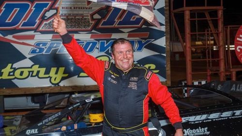 Frank Ingram, who died in a crash last month, is seen celebrating a victory at Dixie Speedway in Cherokee County.