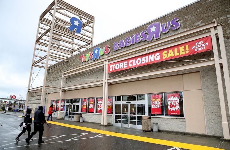 EMERYVILLE, CA - MARCH 15:  Customers enter a Toys R Us store on March 15, 2018 in Emeryville, California. Toys R Us filed for liquidation in a U.S. Bankruptcy court and plans to close 735 stores leaving 33,000 workers without employment.  (Photo by Justin Sullivan/Getty Images)