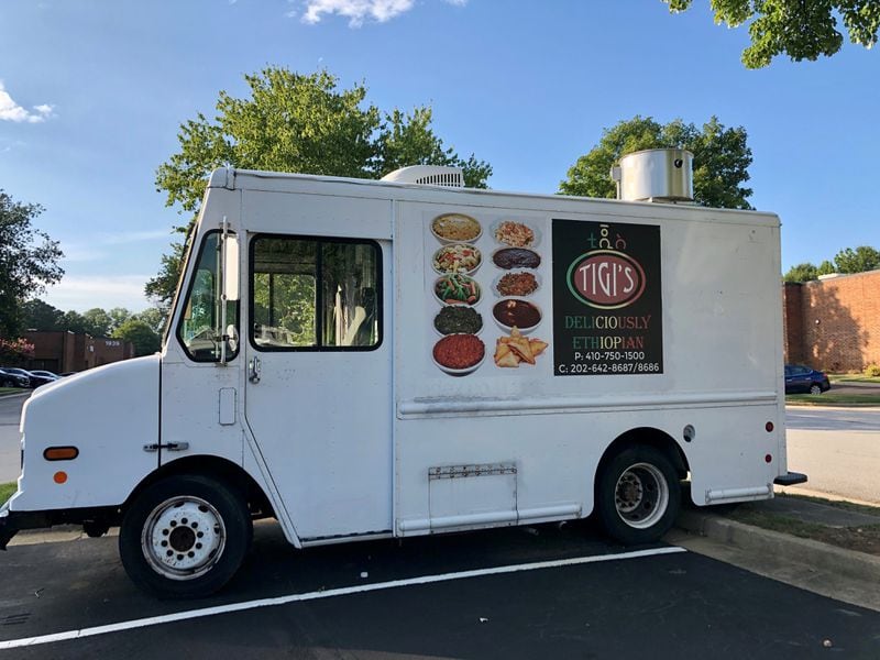 The pandemic has not been kind to the mobile component of Tigi’s Cafe & Food Truck, a new Ethiopian restaurant in Stone Mountain. For now, the truck remains parked outside the business. CONTRIBUTED BY WENDELL BROCK

