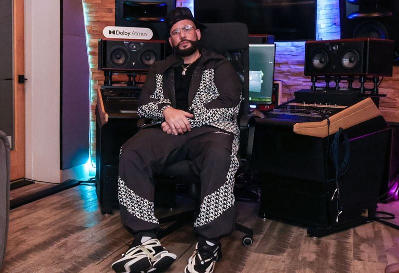 Dj Drama, one of the owners of Means Street Studios poses for a photo in the Dolby Atmos Studio within the space on Wednesday, May 8, 2024. (Natrice Miller/ AJC)