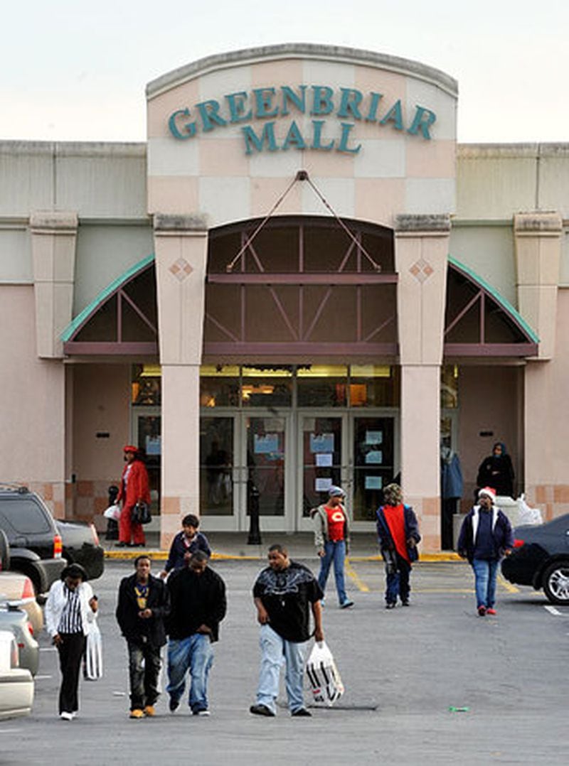 Greenbriar Mall visitors head across the parking lot to their cars after shopping. During recent years this area linchpin has suffered with shootings and smash-and-grabs as well as last month's closing of Magic Johnson's Theater.