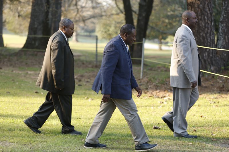 Friends of death row inmate Willie Pye walk to a van headed to Georgia Diagnostic Prison in Jackson, Ga. to witness his execution on Wednesday, March 20, 2024. (Natrice Miller/ Natrice.miller@ajc.com)