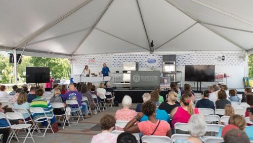 The culinary stage at the AJC Decatur Book Festival is the site for cooking demonstrations and book discussions. This year, more than a dozen food and drink writers will appear on the stage, which is located on the MARTA plaza. Photo by Tom Meyer.