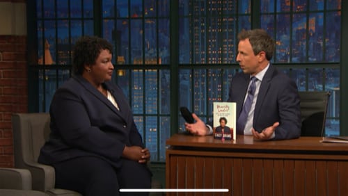 Democrat Stacey Abrams and TV host Seth Meyers.