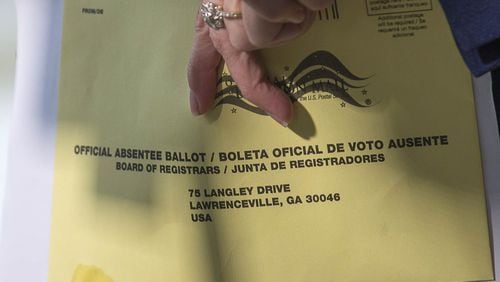 A close-up of the Gwinnett County absentee ballot envelope photographed at a press conference Nov. 12, 2018. Thousands of voters had their ballots rejected across the state due to problems filling out the back of their ballot envelope. ALYSSA POINTER / ALYSSA.POINTER@AJC.COM