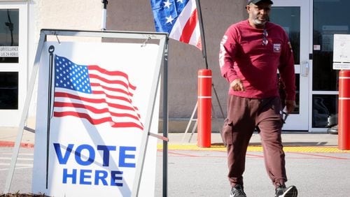 A person is seen leaving the Gwinnett County Voter and Registration Elections on Feb. 19, 2024, the first day of early voting for the Georgia presidential primary. (Miguel Martinez/The Atlanta Journal-Constitution/TNS)