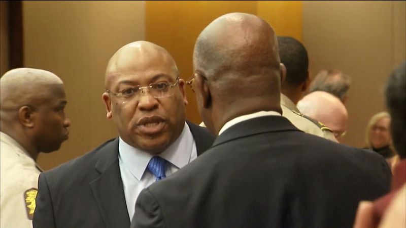 2018 FILE PHOTO: Fulton County prosecutor Clint Rucker speaks with District Attorney Paul Howard on April 23, 2018, at the Fulton County Courthouse. (Channel 2 Action News)