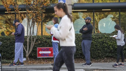 Early voters hit the polls Friday, Nov. 4, 2022, at the Joan P. Garner Library at Ponce De Leon in Atlanta. (John Spink / John.Spink@ajc.com)