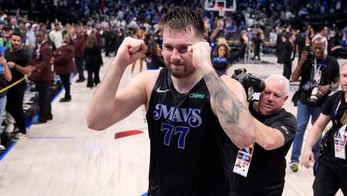 Dallas Mavericks' Luka Doncic celebrates the teams win in Game 6 of an NBA basketball second-round playoff series against the Oklahoma City Thunder Saturday, May 18, 2024, in Dallas. (AP Photo/Tony Gutierrez)