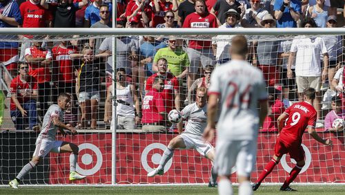 Chicago Fire forward Luis Solignac (9) scores against Atlanta United during the first half of an MLS soccer match, Saturday, June 10, 2017, in Bridgeview, Ill. (AP Photo/Kamil Krzaczynski)