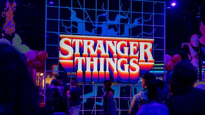 "Stranger Things: The Experience" at Pullman Yards ends in the Mix-Tape lounge where pizza, ice cream, cocktails, merchandise and photo opportunities are available.  (Jenni Girtman for The Atlanta Journal-Constitution)