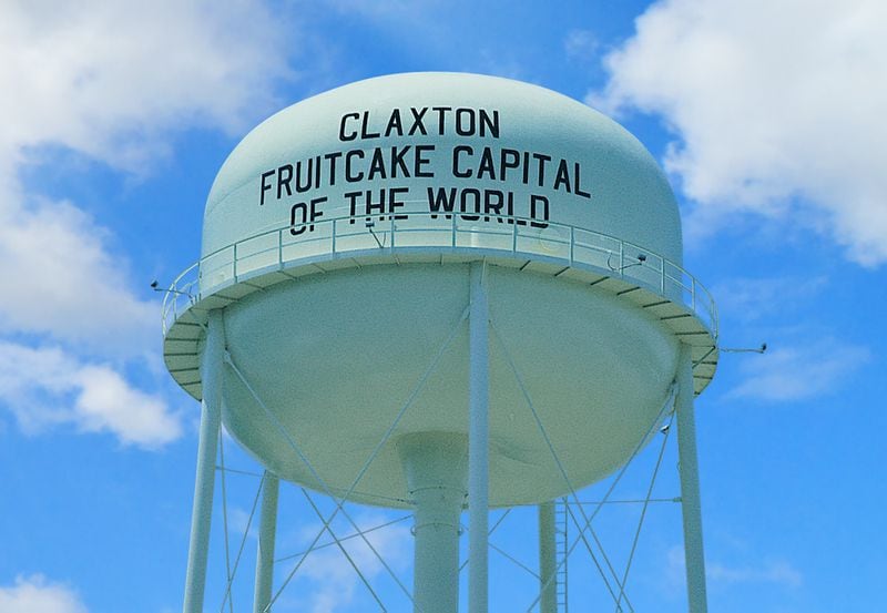 The Claxton water tower proclaims the Georgia city as fruitcake capital of the world. The same claim is made by Corsicana, Texas, home to fruitcake maker Collin Street Bakery. Courtesy of Claxton Bakery