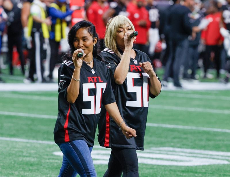 T-Boz And Chilli The Atlanta Falcons celebrate Hip-Hop 50 with performances and appearances during their NFL football game between the Atlanta Falcons and the New Orleans Saints in Atlanta on Sunday, Nov. 26, 2023.   (Bob Andres for the Atlanta Journal Constitution)