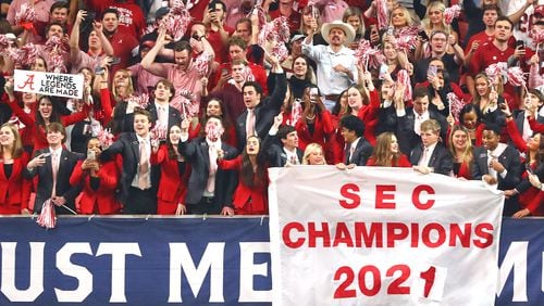 Alabama fans celebrate beating Georgia in the SEC Championship game on Saturday, Dec 4, 2021, in Atlanta.   “Curtis Compton / Curtis.Compton@ajc.com”`