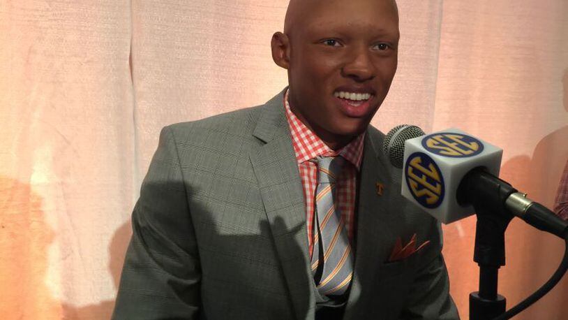 Tennessee quarterback Josh Dobbs talks to reporters at SEC Media Days in Hoover on Tuesday. the Alpharetta resident is an aerospace engineering major and one day hopes to design and build airplanes. He took over as the Vols’ starter with five games left in the season last year and led them to a 4-1 record in that span. (AJC / CHIP TOWERS)