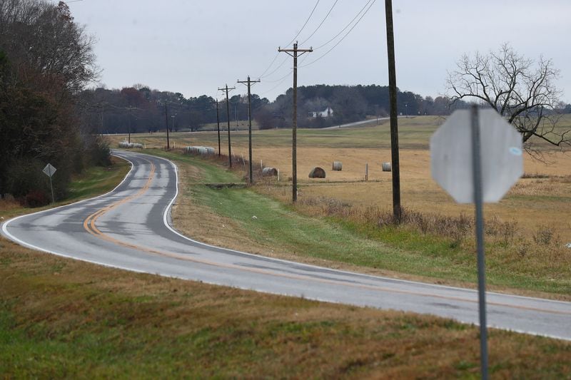 Pasture land sits on either side of Davis Academy Road where it runs through the potential Rivian electric vehicle plant site on Wednesday, Dec 8, 2021, near Rutledge. Curtis Compton / Atlanta Journal-Constitution