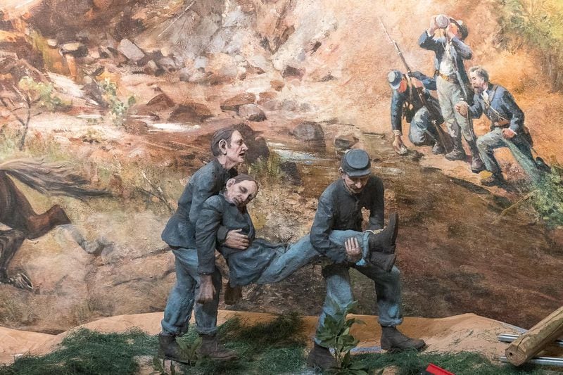 Plaster figurines are part of the diorama that serves as the foreground to “The Battle of Atlanta” painting at the Atlanta History Center. ALYSSA POINTER/ALYSSA.POINTER@AJC.COM
