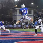 Walton’s Wyatt Sonderman (10) leaps into the air to catch the ball for a touchdown against Camden County during the second half of a GHSA semifinal game Friday, December 1, 2023. (Daniel Varnado/For the AJC)