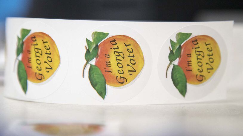 03/02/2020 — Sandy Springs, Georgia — Stickers are available for early voters during the presidential primary election at Sandy Springs library, Monday, March 2, 2020. (ALYSSA POINTER/ALYSSA.POINTER@AJC.COM)