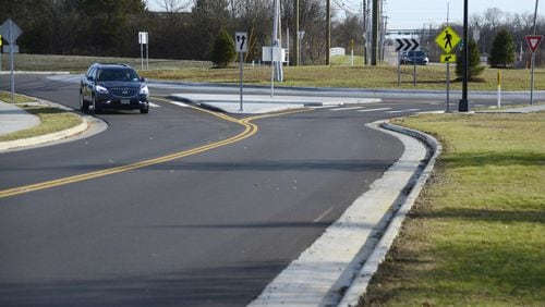 The Butler County Engineer’s Office wrapped up the Gilmore Road/Hamilton-Mason Road roundabout two days early. It’s the 18th roundabout in the county, which gives the Butler County 24 in total. The county has several more planned to be constructed in the next two years. Pictured is Fairfield Twp. roundabout at Gilmore and Hamilton-Mason roads. MICHAEL D. PITMAN/STAFF