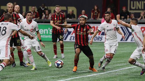 October 30, 2019 Atlanta: Atlanta United forward Josef Martinez battles against Toronto FC defenders in front of the Toronto FC goal during the second half in the Eastern Conference Final on Wednesday, October 30, 2019, in Atlanta.   Curtis Compton/ccompton@ajc.com