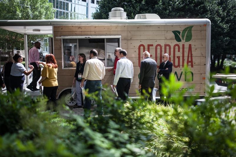 Food inspectors prepare to collect samples to test for pathogens on a food truck at the Association of  Food and Drug Officials educational conference at the Grand Hyatt Atlanta in Buckhead on Saturday, June 22, 2019.  (Photo: BRANDEN CAMP/SPECIAL TO THE AJC)